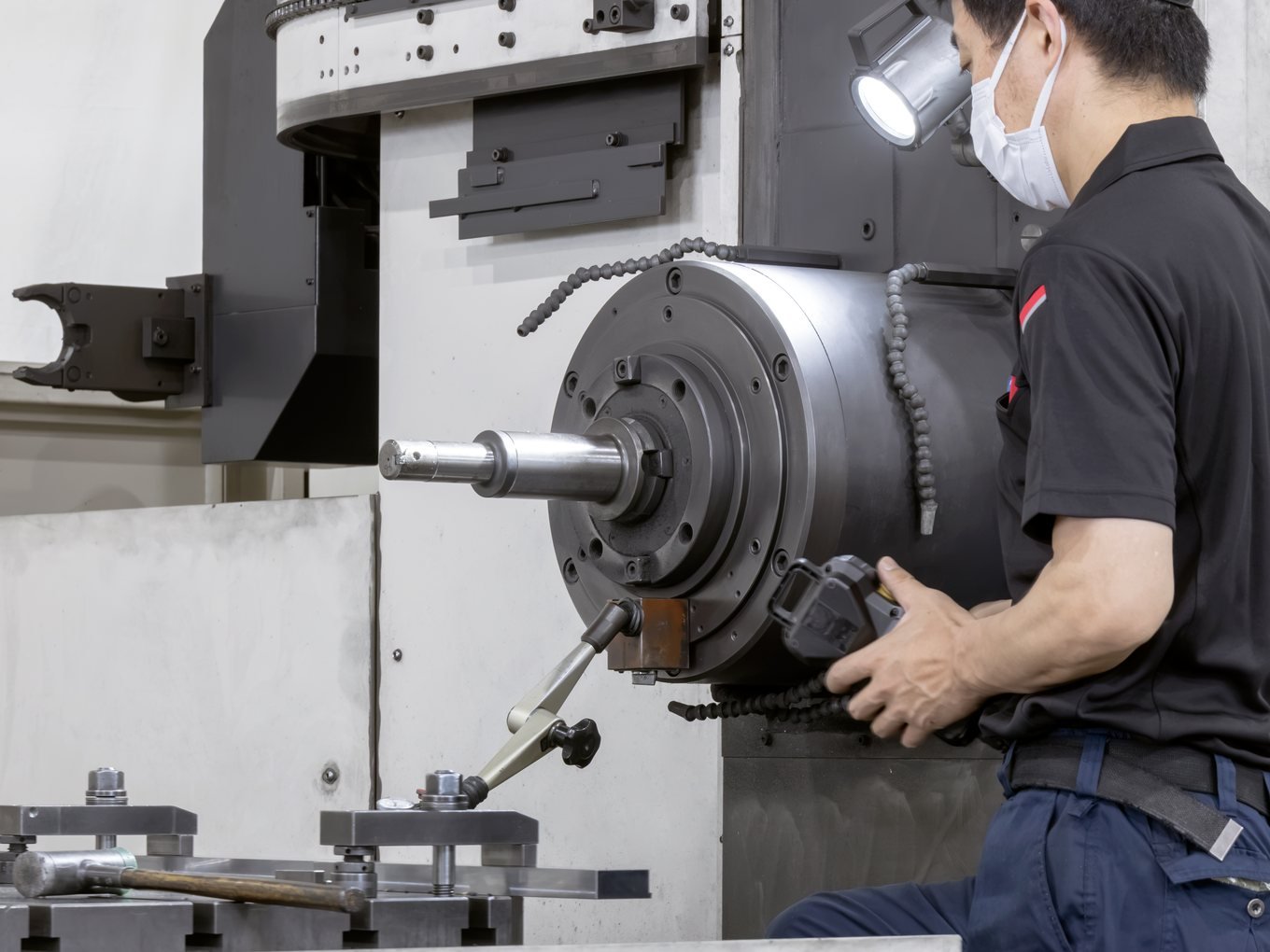 Skilled technician assembling purpose-built machinery